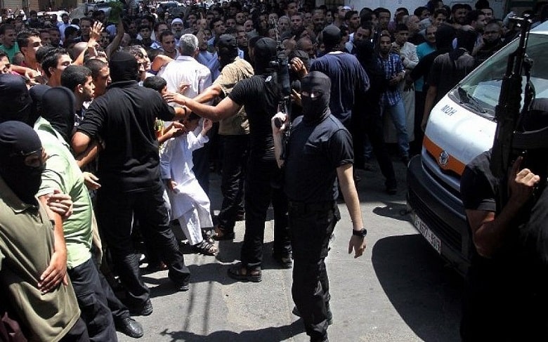 Hamas executed six men in full public view