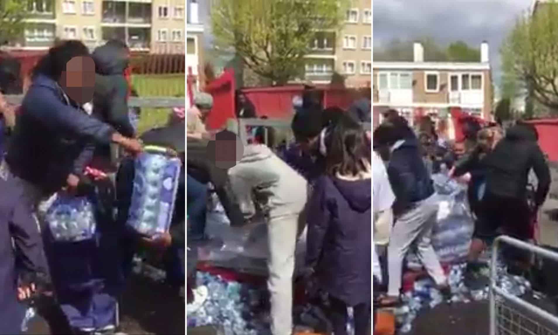 People Stealing Drinking Water at a Marathon