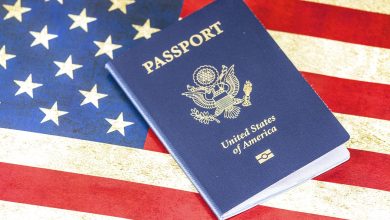 US flag and visa documents representing H-1B policy changes